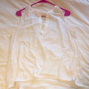 Sheer back sleeveless top.